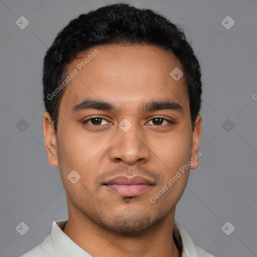 Neutral latino young-adult male with short  black hair and brown eyes