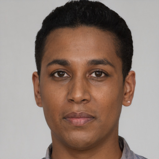 Neutral black young-adult male with short  black hair and brown eyes