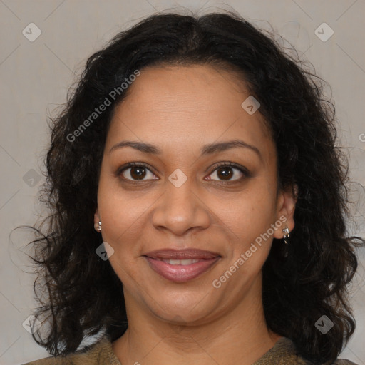 Joyful black adult female with medium  brown hair and brown eyes