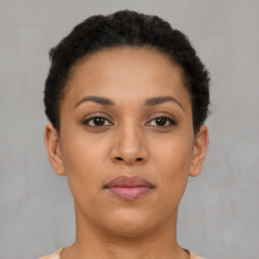 Neutral black young-adult female with short  brown hair and brown eyes