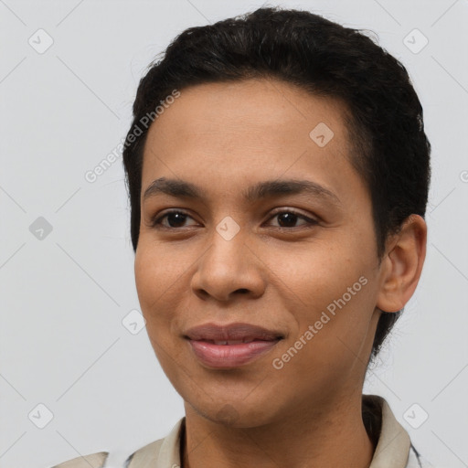 Joyful latino young-adult female with short  brown hair and brown eyes