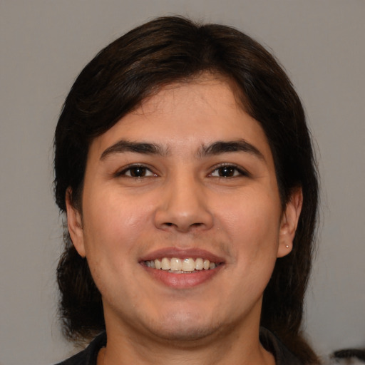 Joyful white young-adult male with medium  brown hair and brown eyes