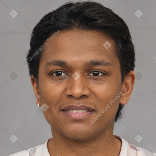 Joyful black young-adult male with short  brown hair and brown eyes