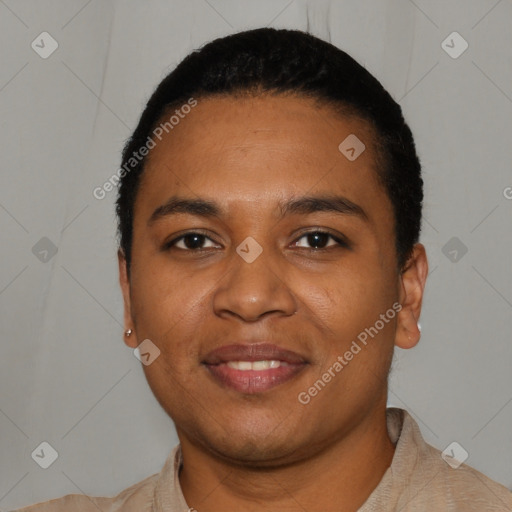 Joyful black young-adult female with short  black hair and brown eyes