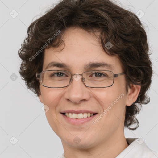 Joyful white adult female with medium  brown hair and green eyes