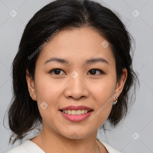 Joyful asian young-adult female with medium  brown hair and brown eyes