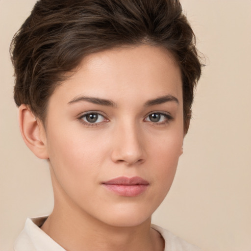 Neutral white young-adult female with short  brown hair and brown eyes