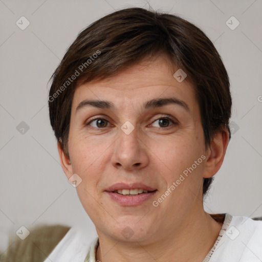 Joyful white adult female with short  brown hair and brown eyes