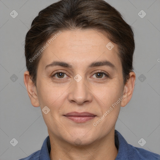 Joyful white adult female with short  brown hair and brown eyes