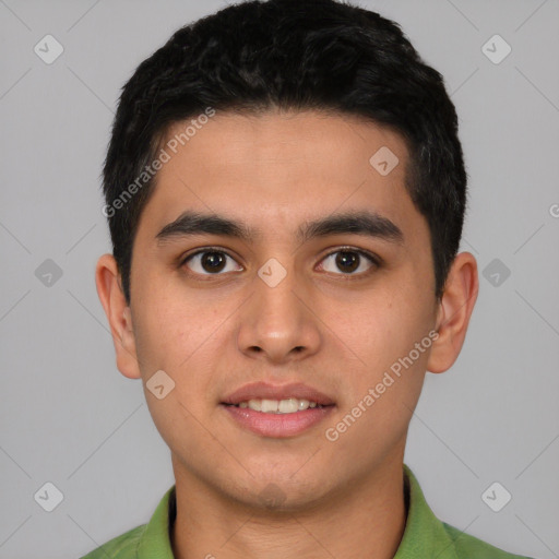 Joyful white young-adult male with short  black hair and brown eyes