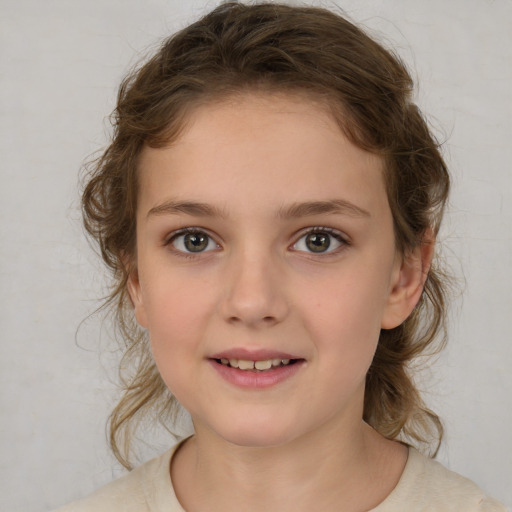 Joyful white child female with medium  brown hair and brown eyes