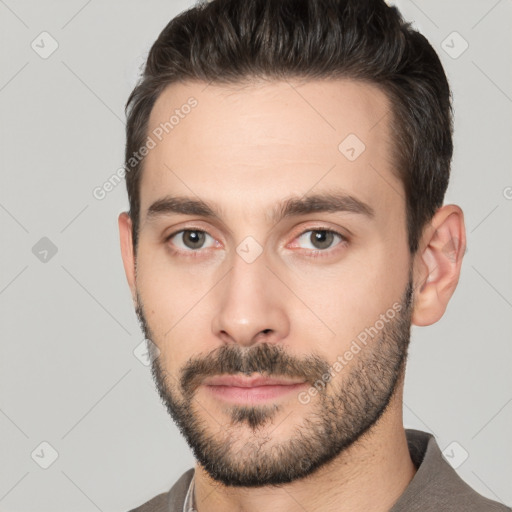 Neutral white young-adult male with short  brown hair and brown eyes