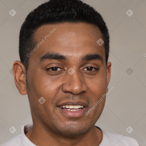 Joyful black young-adult male with short  brown hair and brown eyes