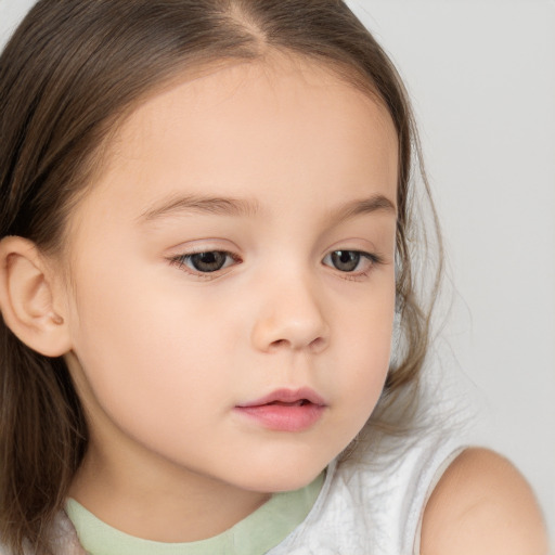 Neutral white child female with medium  brown hair and brown eyes