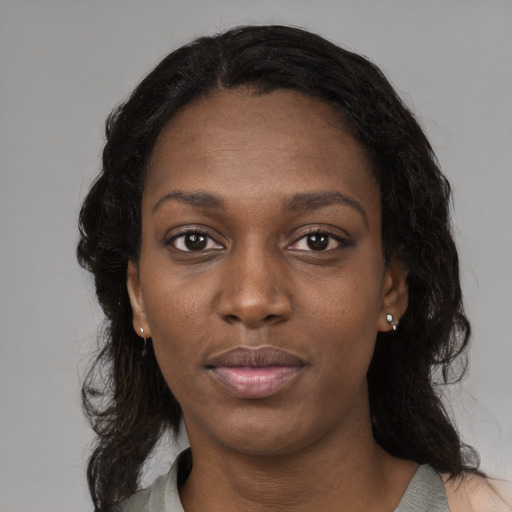 Neutral black young-adult female with medium  black hair and brown eyes