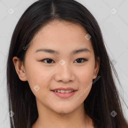 Joyful asian young-adult female with long  brown hair and brown eyes