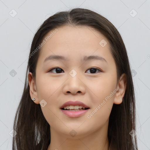 Joyful asian young-adult female with long  brown hair and brown eyes