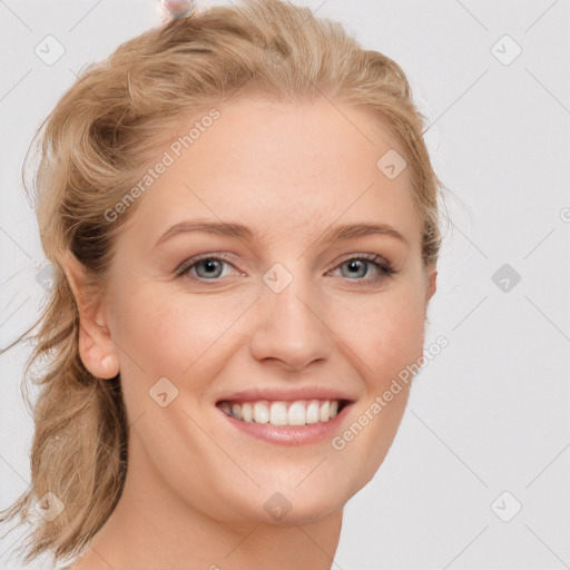 Joyful white young-adult female with long  brown hair and blue eyes