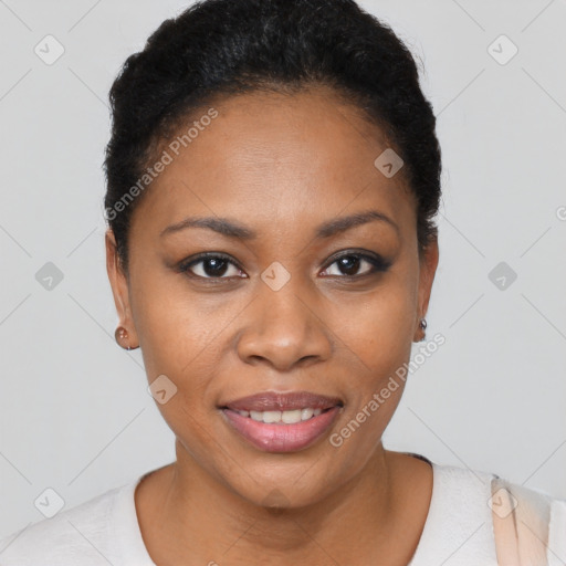 Joyful black young-adult female with short  brown hair and brown eyes