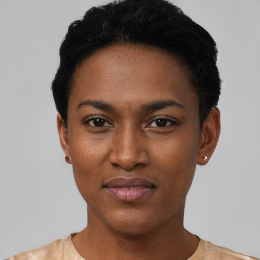 Joyful latino young-adult female with short  black hair and brown eyes