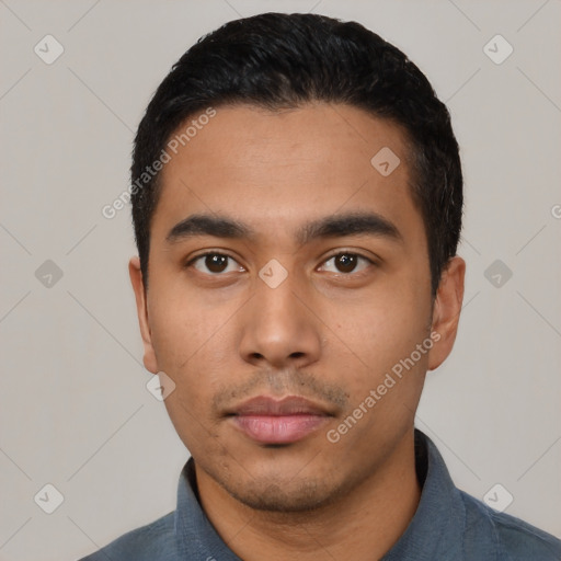 Neutral latino young-adult male with short  black hair and brown eyes