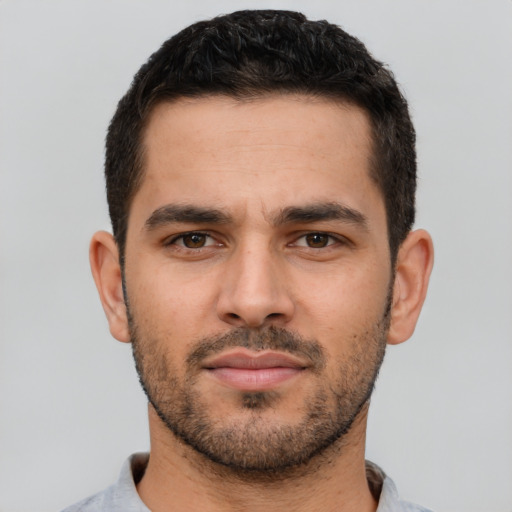 Neutral white young-adult male with short  brown hair and brown eyes