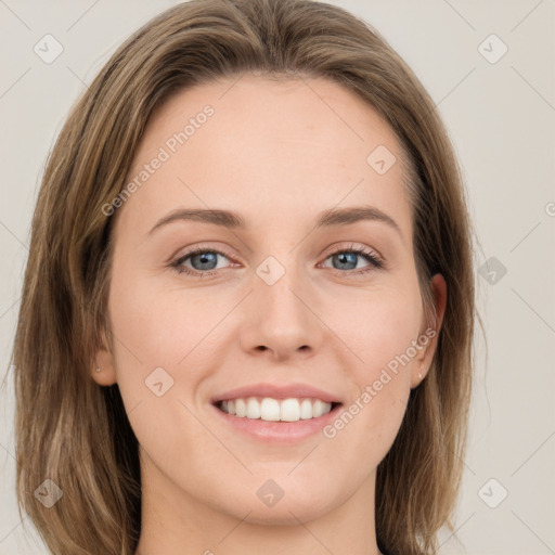 Joyful white young-adult female with medium  brown hair and green eyes