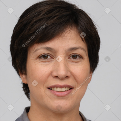 Joyful white adult female with short  brown hair and brown eyes