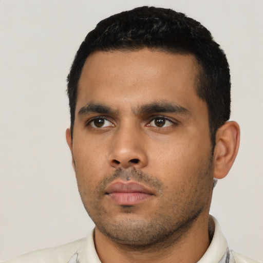 Neutral latino young-adult male with short  black hair and brown eyes