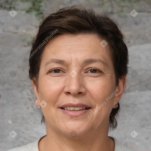 Joyful white adult female with short  brown hair and brown eyes