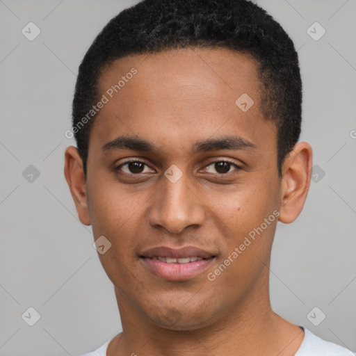 Joyful black young-adult male with short  brown hair and brown eyes