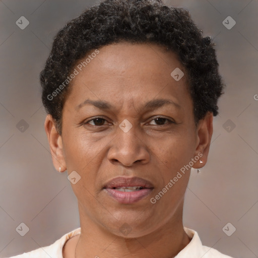 Joyful black adult female with short  brown hair and brown eyes