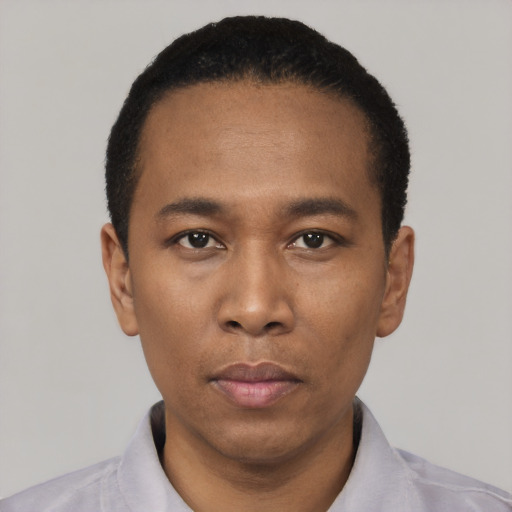 Neutral black young-adult male with short  black hair and brown eyes