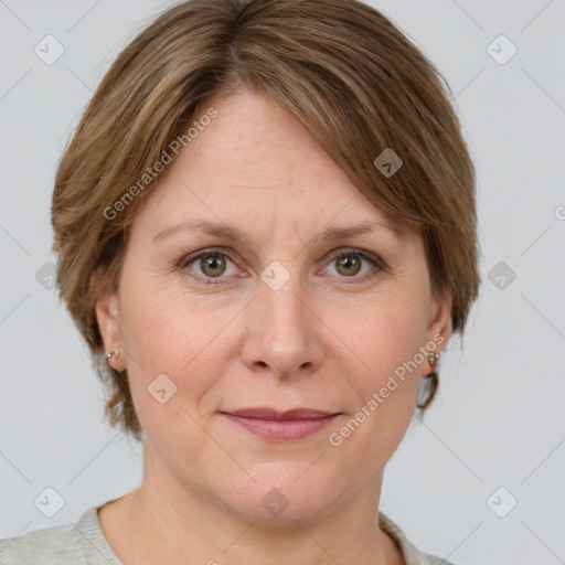 Joyful white adult female with medium  brown hair and grey eyes