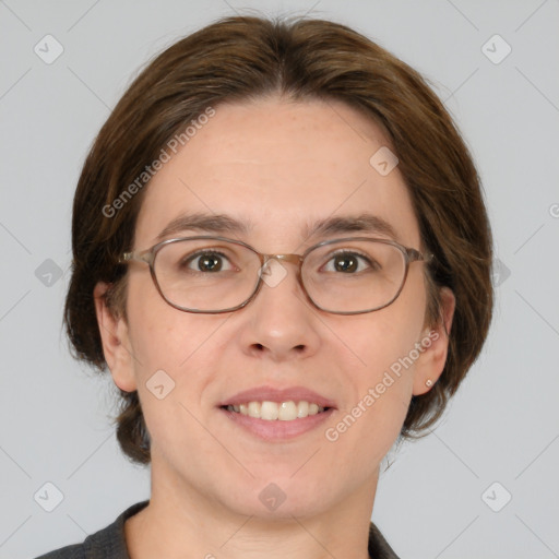 Joyful white adult female with medium  brown hair and green eyes