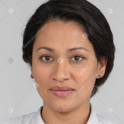 Joyful white adult female with medium  brown hair and brown eyes