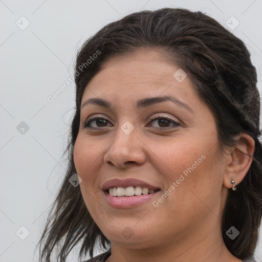 Joyful white young-adult female with long  brown hair and brown eyes