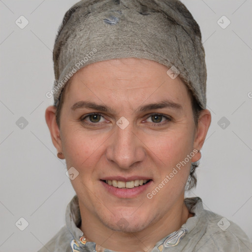 Joyful white adult female with short  brown hair and grey eyes