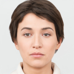 Neutral white young-adult female with short  brown hair and brown eyes