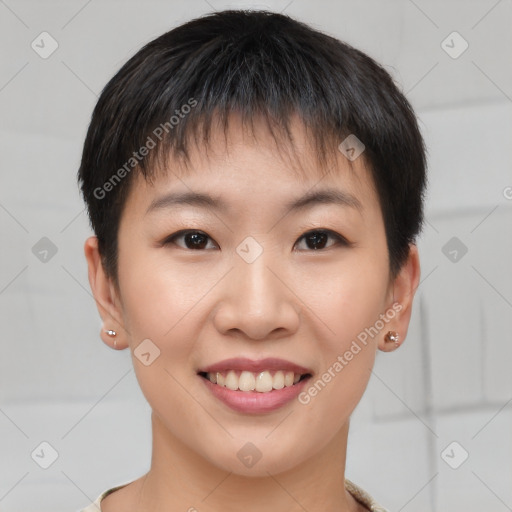 Joyful asian young-adult female with short  brown hair and brown eyes