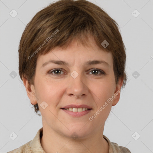 Joyful white young-adult female with short  brown hair and grey eyes