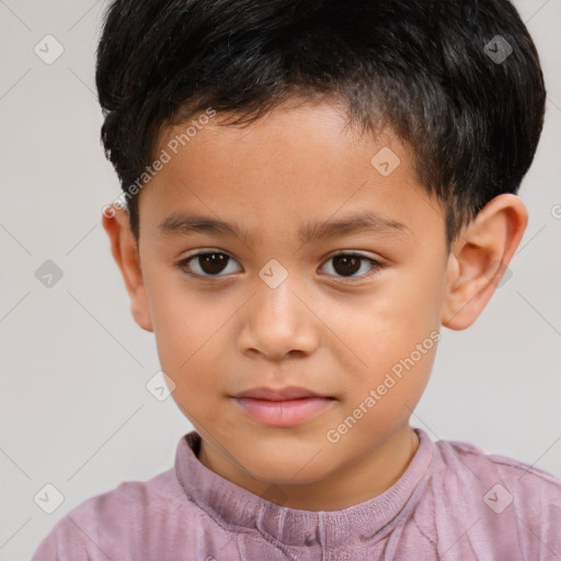 Joyful white child male with short  brown hair and brown eyes