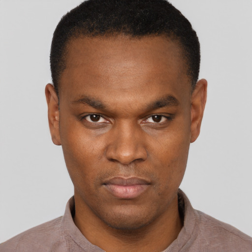 Neutral black young-adult male with short  brown hair and brown eyes