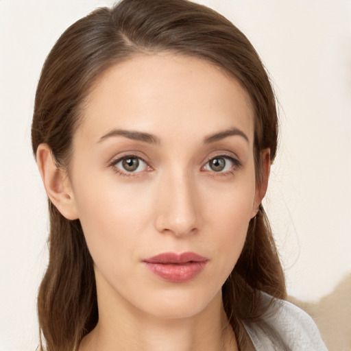 Neutral white young-adult female with long  brown hair and grey eyes