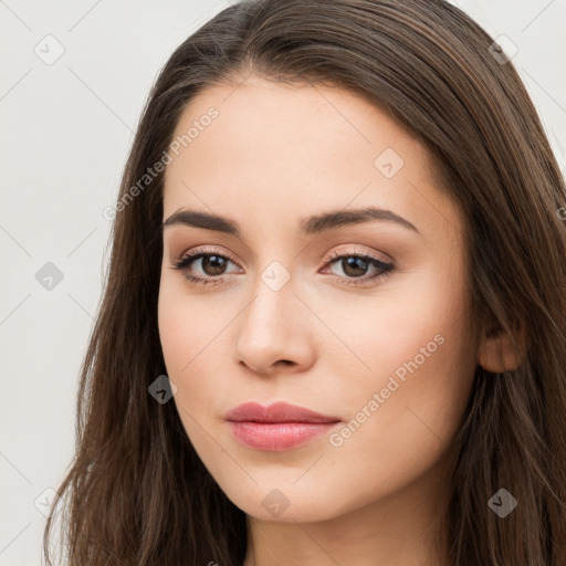 Neutral white young-adult female with long  brown hair and brown eyes