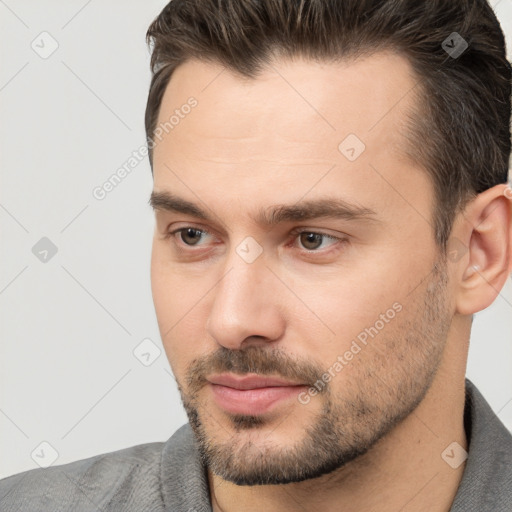 Neutral white young-adult male with short  brown hair and brown eyes