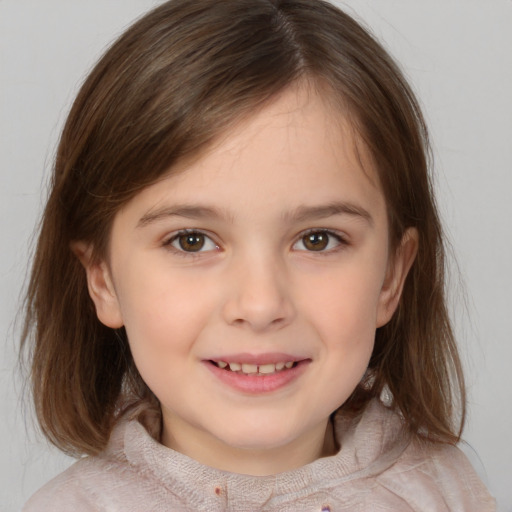 Joyful white child female with medium  brown hair and brown eyes