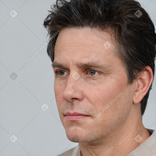 Neutral white adult male with short  brown hair and brown eyes