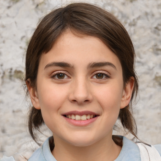 Joyful white child female with medium  brown hair and brown eyes