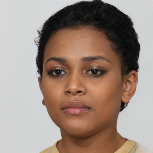 Neutral latino young-adult female with short  black hair and brown eyes